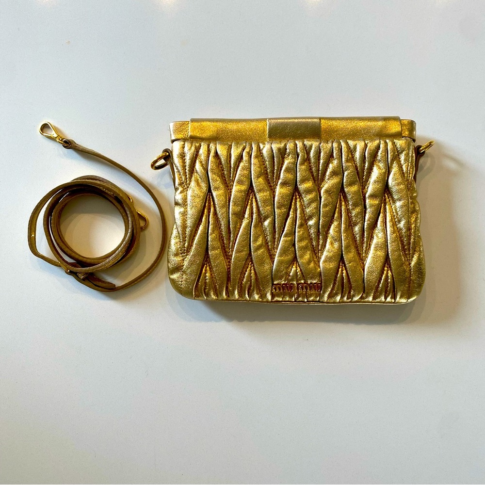 Gold Miu Miu bag